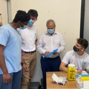 Dr Dhupelia with the team from The VacSeen Project